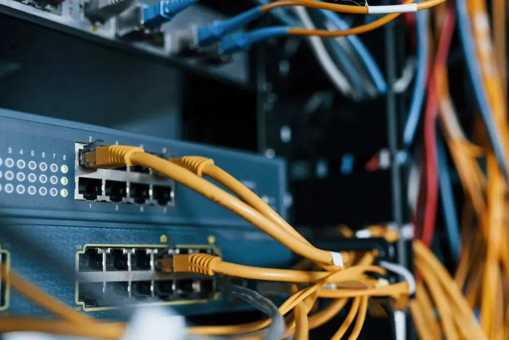 Network switch with Ethernet cables for business connectivity
