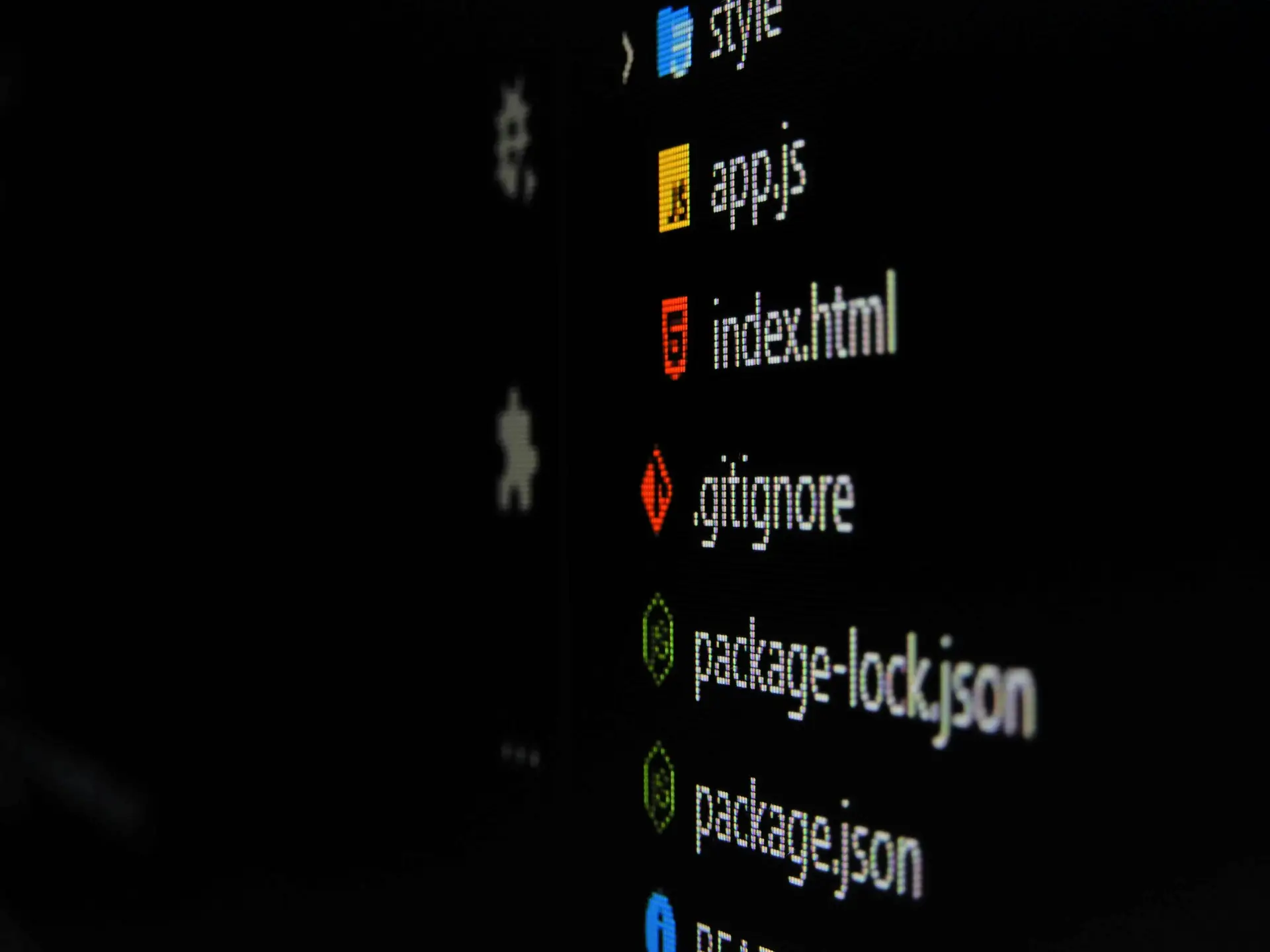Computer screen displaying software files and programming code