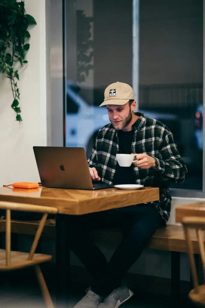 Man using a laptop for remote computer work