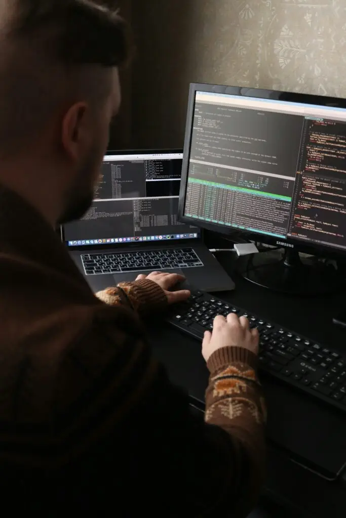 IT specialist working with computer systems and technical data